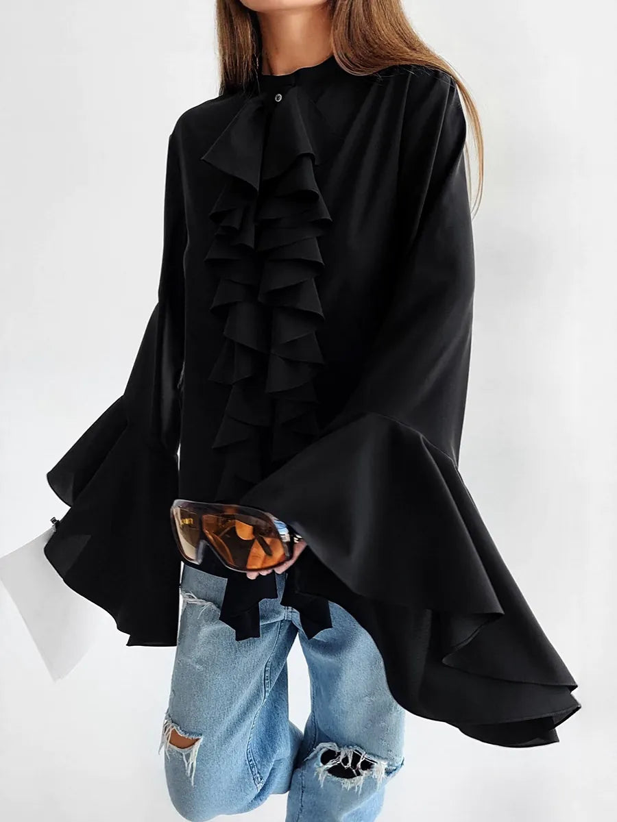 Black ruffled blouse with a white background #Color_Black