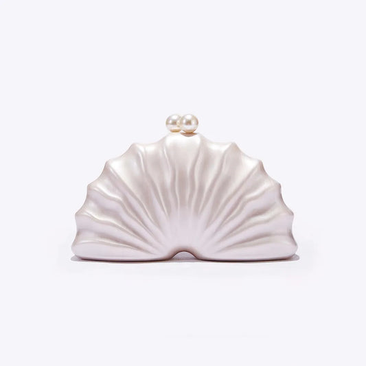 Shell-shaped clutch bag with a pearl on a white background. #Color_PearlWhite