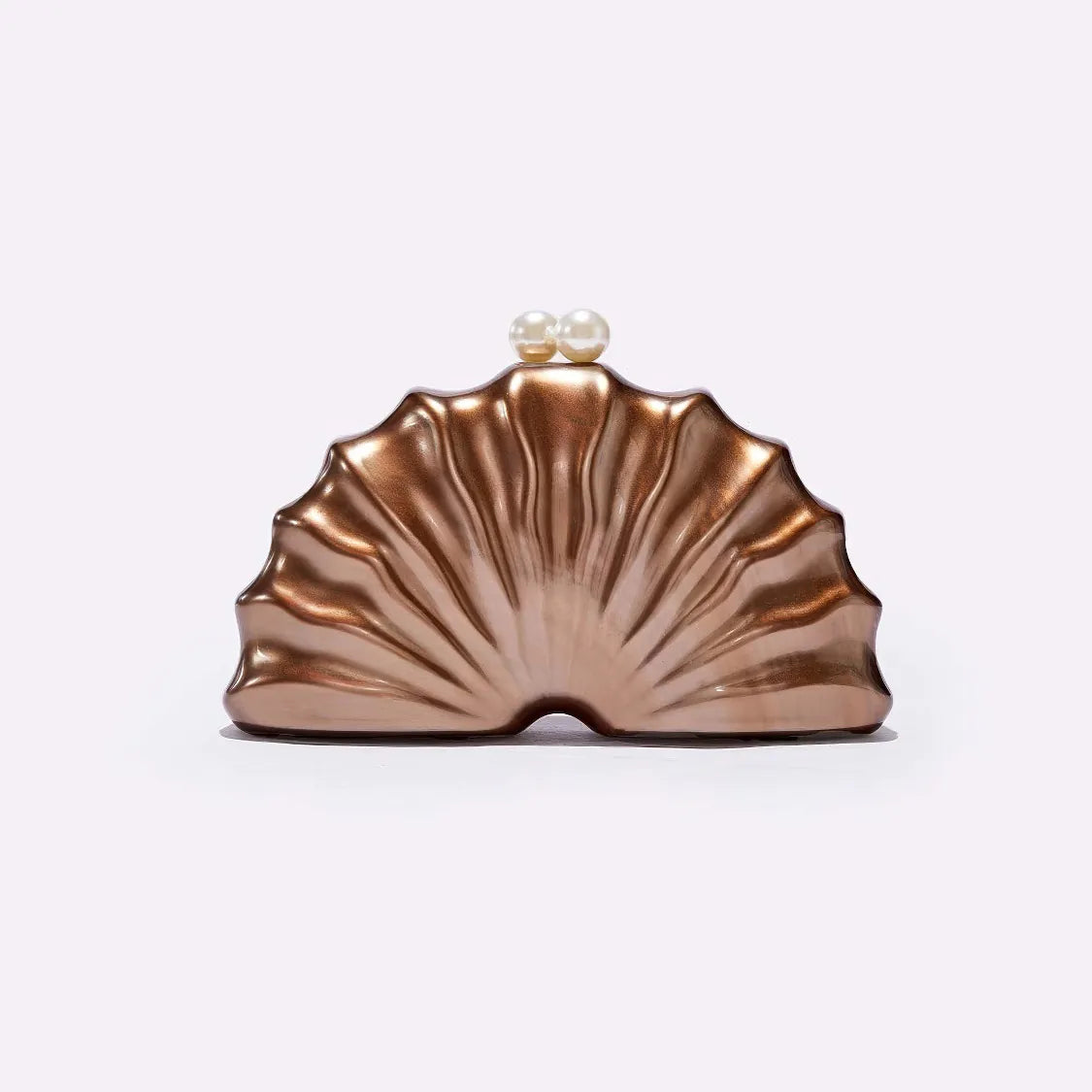 Rose gold shell-shaped clutch bag on a white background. #Color_Coffee