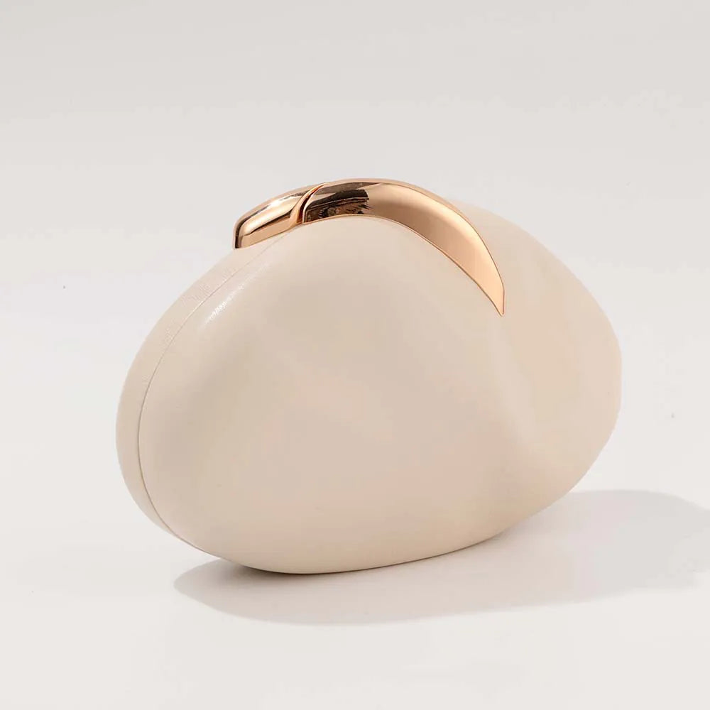 Beige clutch bag with gold accent on a white background. #Color_Beige