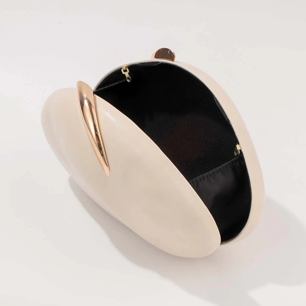 Beige clutch bag with gold accents on a white background. #Color_Beige