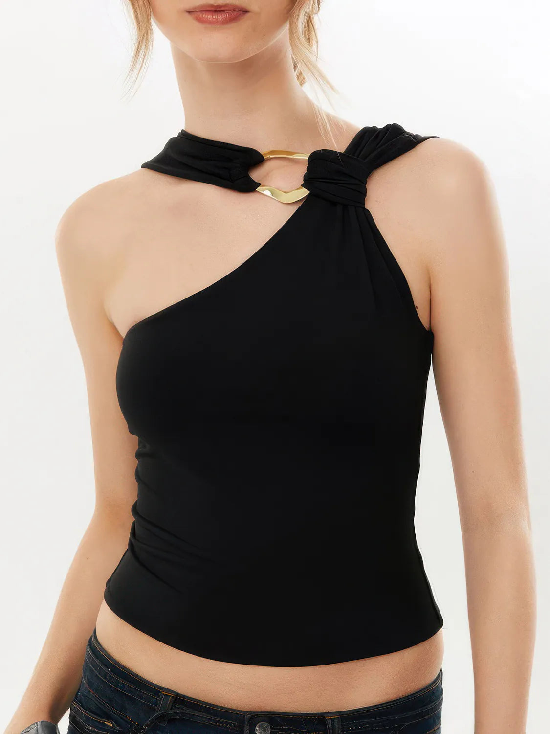 Black halter top worn by a model on a white background #Color_Black