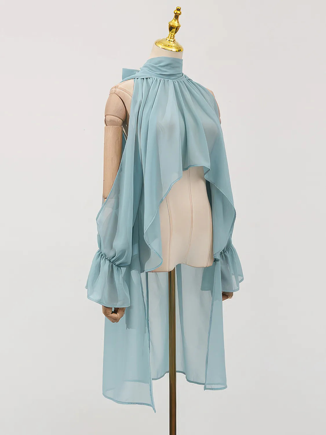 Light blue dress on a mannequin against a white background. #Color_Blue