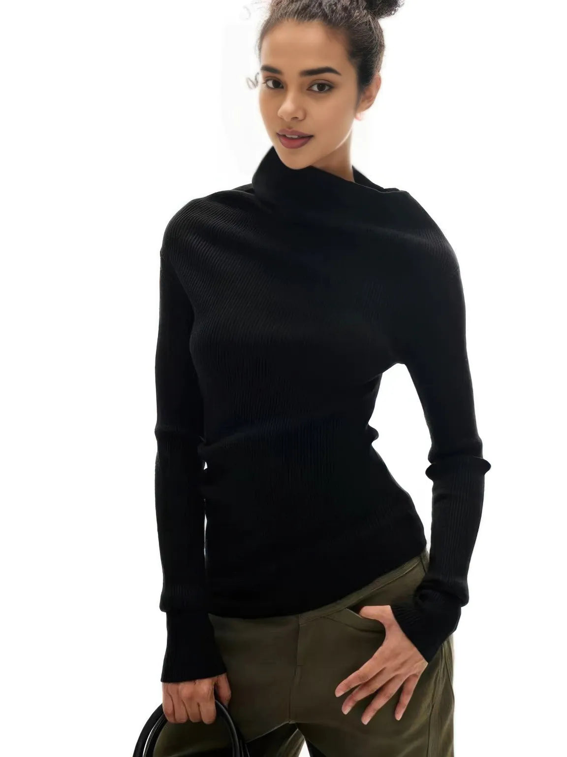 Woman wearing a black turtleneck sweater on a white background.#Color_Black