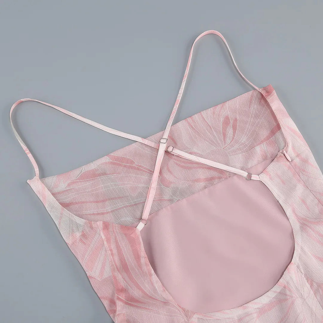 Pink lace lingerie set on a gray background