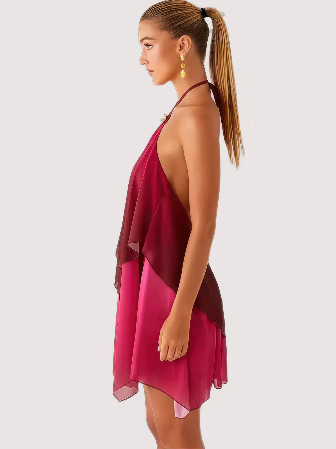 Woman wearing a pink and red dress on a white background. #Color_DarkRed