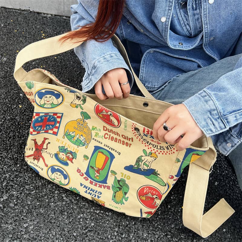 Printed canvas crossbody bag