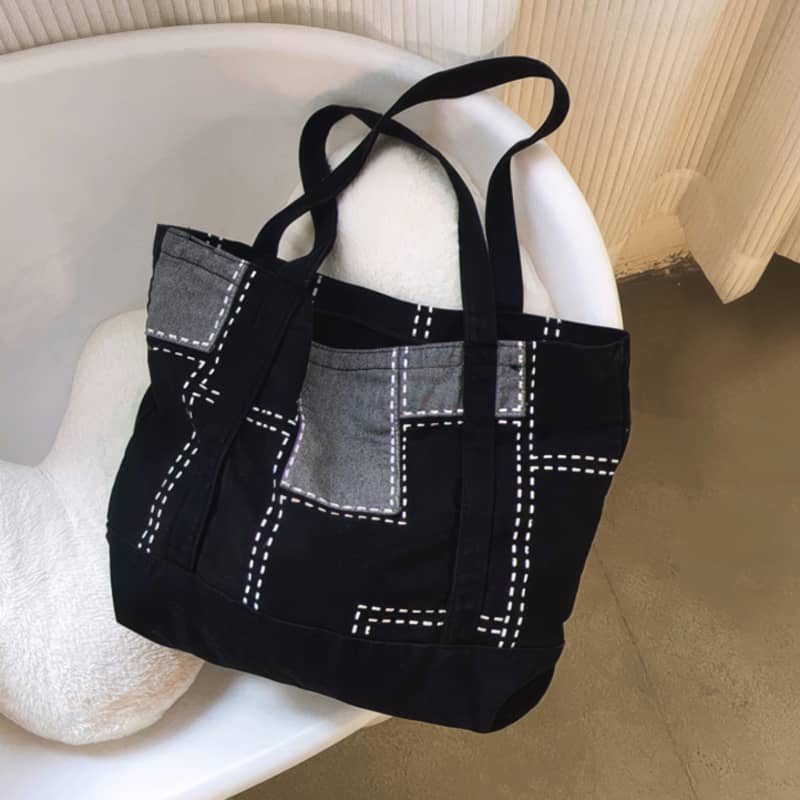 Hand-stitched wash-denim tote bag