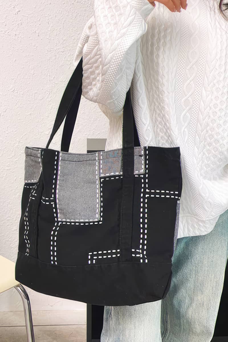 Hand-stitched wash-denim tote bag